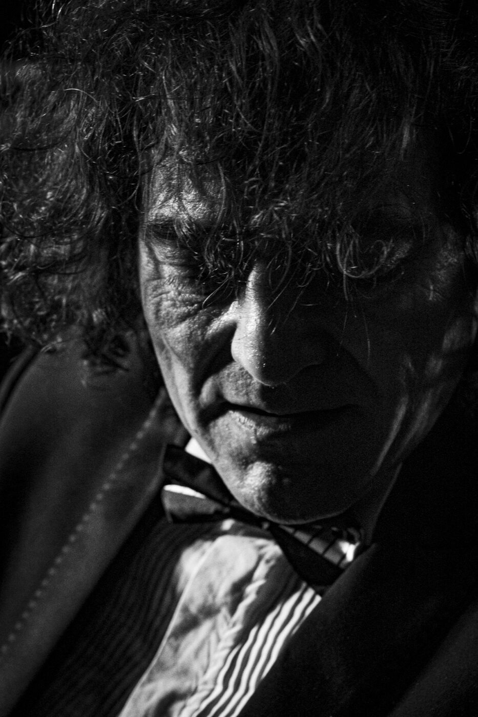 Dramatic black-and-white portrait of Robin Finesilver